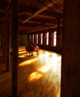 The loft space of Art & Industrie, empty of all but a Steinway piano... and the afternoon sunlight.